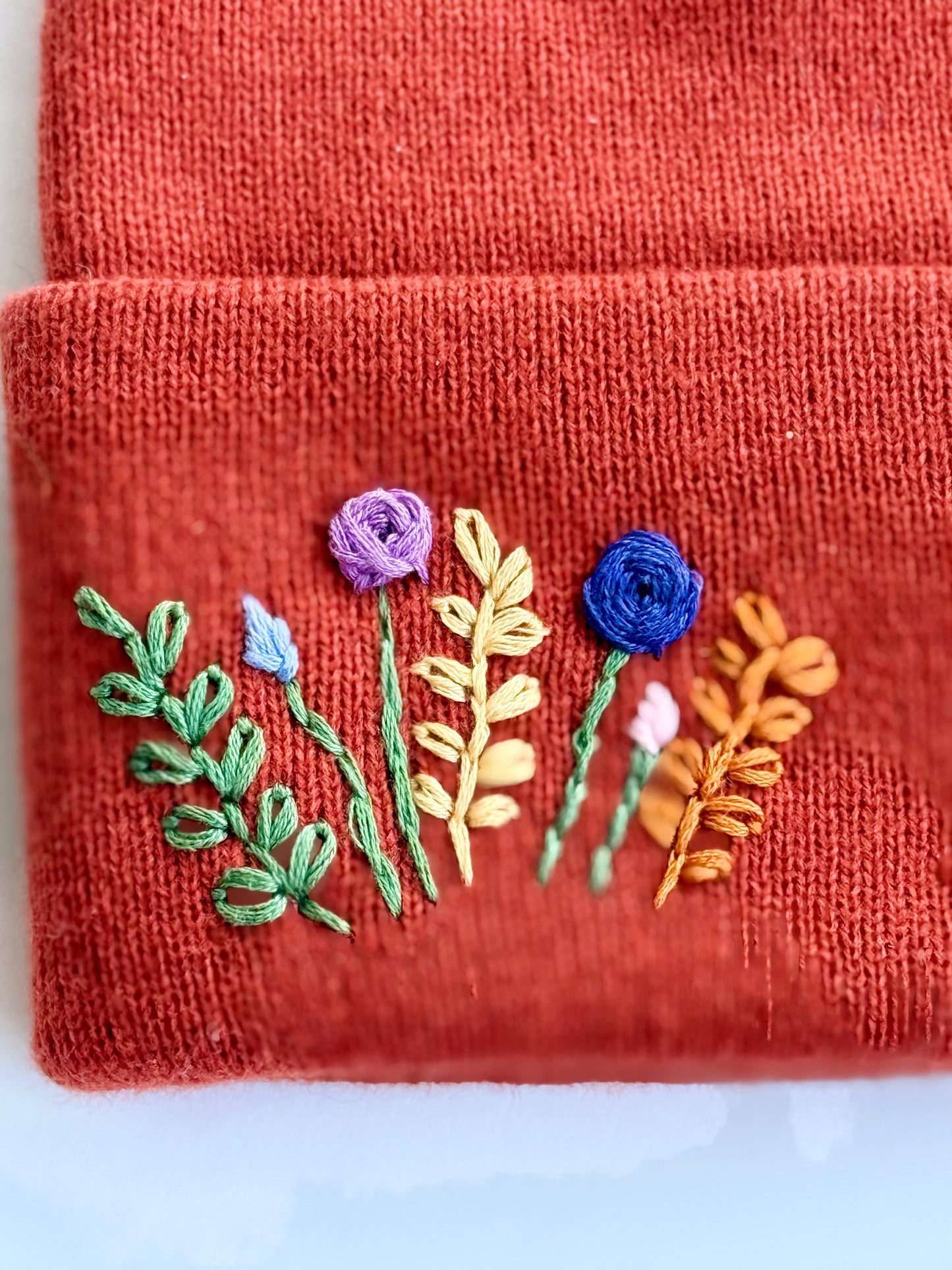 Burnt orange youth embroidered winter hat